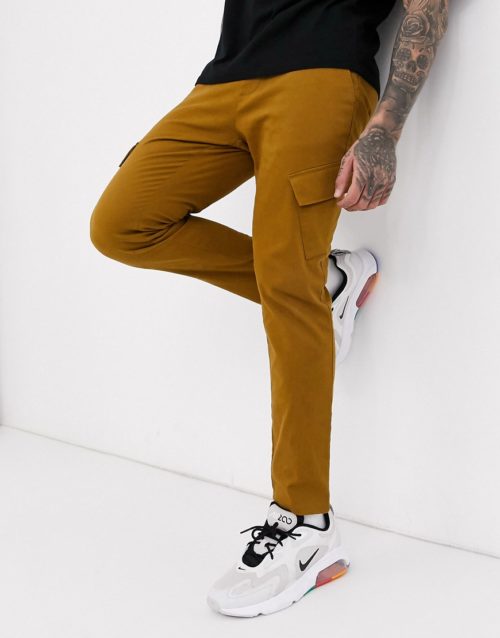ASOS DESIGN skinny ankle grazer cargo trousers with slanted pockets in tan-Brown