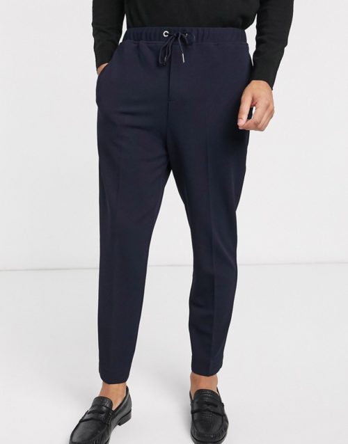 Rudie elasticated cropped tapered jersey trousers-Navy