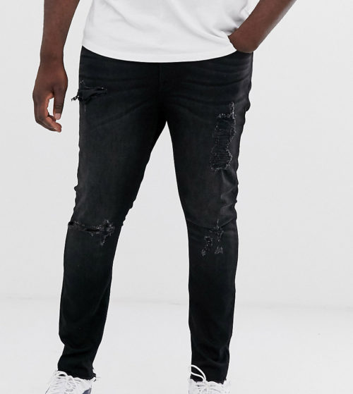 ASOS DESIGN Plus super skinny jeans in washed black with heavy rips
