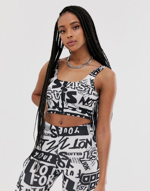 ASOS DESIGN co-ord bralet in newspaper graphic with zip-Black