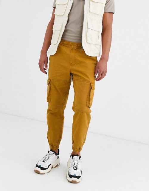 Bershka cargo trousers with pocket detail in brown