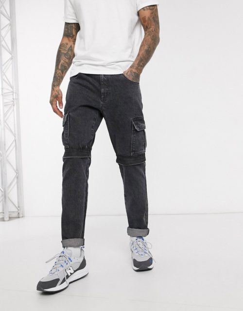 ASOS DESIGN rigid slim jeans in washed black with cargo pockets and zip off details