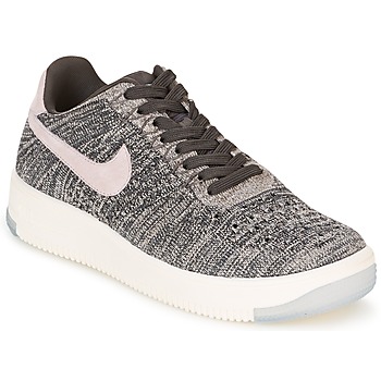 Nike AIR FORCE 1 FLYKNIT LOW women's Shoes (Trainers) in Beige. Sizes available:2.5